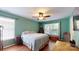 Bright bedroom with large window and hardwood style flooring at 725 Chelton Ln, Fort Mill, SC 29715