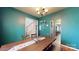 Open dining room with views of the staircase and kitchen at 725 Chelton Ln, Fort Mill, SC 29715