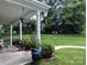 Charming front porch with views of the landscaped yard and verdant greenery at 725 Chelton Ln, Fort Mill, SC 29715
