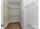 Walk-in closet equipped with multiple shelves for ample and organized storage at 7518 Turley Ridge Ln, Charlotte, NC 28273