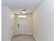 Clean entryway with light wood-look floors and white door at 7518 Turley Ridge Ln, Charlotte, NC 28273