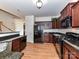 Modern kitchen featuring granite countertops, stainless steel appliances, and ample cabinet space at 7518 Turley Ridge Ln, Charlotte, NC 28273