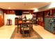Finished basement with dining area, wine rack, and entertainment setup at 802 E Franklin St, Monroe, NC 28112