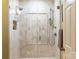 Modern bathroom featuring a glass-enclosed shower with tile walls and a chrome finish at 802 E Franklin St, Monroe, NC 28112