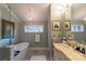Elegant bathroom featuring a freestanding tub, marble floors, and classic fixtures at 802 E Franklin St, Monroe, NC 28112
