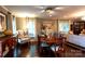 Inviting dining room with a large wooden table and view of the living area at 802 E Franklin St, Monroe, NC 28112