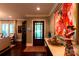Inviting foyer features hardwood floors, elegant artwork, and natural light, setting a welcoming tone at 802 E Franklin St, Monroe, NC 28112