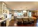 Bright, open kitchen with a large island, stainless steel appliances, and hardwood floors at 802 E Franklin St, Monroe, NC 28112