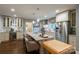 Spacious kitchen features an island with seating, stainless appliances, and custom cabinetry at 802 E Franklin St, Monroe, NC 28112