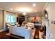 Inviting living room features a fireplace, chandelier, and elegant furnishings at 802 E Franklin St, Monroe, NC 28112