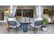 Outdoor patio with comfortable seating, curtains, and stylish decor at 802 E Franklin St, Monroe, NC 28112