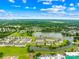 Panoramic aerial shot showcasing the community's layout near a serene lake and lush green spaces at 921 Summerlake Dr, Fort Mill, SC 29715