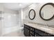 Bathroom with granite double sinks, soaking tub, and shower at 921 Summerlake Dr, Fort Mill, SC 29715