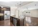 Well-designed kitchen with granite counters and stainless appliances open to the living area at 921 Summerlake Dr, Fort Mill, SC 29715