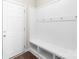 Mudroom with a built-in bench, storage shelves, and coat hooks, perfect for organization at 921 Summerlake Dr, Fort Mill, SC 29715