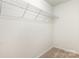 Walk-in closet with wire shelving for organized storage at 9416 Cotton Gum Rd, Charlotte, NC 28227