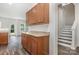 Kitchen featuring granite countertops and a view into the living room at 9416 Cotton Gum Rd, Charlotte, NC 28227