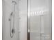 Modern shower with white tile and glass door at 9416 Cotton Gum Rd, Charlotte, NC 28227