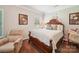 Comfortable bedroom featuring a decorative bed frame, soft lighting, and a relaxing ambiance for peaceful nights at 9428 Carneros Creek Rd, Charlotte, NC 28214