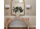 Elegant entryway featuring modern lighting, a decorative mirror, and stylish console table at 1070 Bull Dog Ln, Wingate, NC 28174