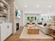 The open living room shows a fireplace and hardwood floors, creating a stylish and inviting space at 1070 Bull Dog Ln, Wingate, NC 28174