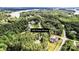 Aerial view of a home nestled in a lush green landscape at 109 Trent Pines Dr, Mooresville, NC 28117