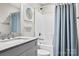 Clean bathroom featuring a shower-tub combo with a white vanity and granite countertop at 109 Trent Pines Dr, Mooresville, NC 28117