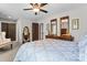 Comfortable bedroom featuring an arm chair and large windows for natural light at 109 Trent Pines Dr, Mooresville, NC 28117