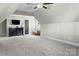 Spacious bonus room with a ceiling fan and a large window at 109 Trent Pines Dr, Mooresville, NC 28117