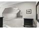 Large bonus room featuring neutral carpet and a ceiling fan at 109 Trent Pines Dr, Mooresville, NC 28117