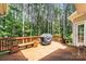 Wooden deck with BBQ grill and bench at 109 Trent Pines Dr, Mooresville, NC 28117