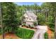 Beautiful two-story home with brick accents, a manicured lawn, and a spacious driveway at 109 Trent Pines Dr, Mooresville, NC 28117