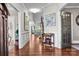 Elegant foyer with hardwood floors, crown molding, and views of staircase at 109 Trent Pines Dr, Mooresville, NC 28117