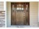 Stunning stained wood front door with glass accents and modern hardware at 109 Trent Pines Dr, Mooresville, NC 28117