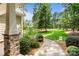 Inviting view of a spacious lawn, lush greenery, and wooded backyard at 109 Trent Pines Dr, Mooresville, NC 28117