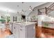 Spacious kitchen island with granite countertops and an open floor plan at 109 Trent Pines Dr, Mooresville, NC 28117