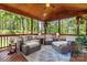Inviting screened porch featuring stylish furniture at 109 Trent Pines Dr, Mooresville, NC 28117