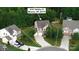 Aerial view of a home on a cul-de-sac with approximate parcel lines and mature trees at 1210 Tabitha Ct, Monroe, NC 28110