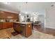 Lovely kitchen features a granite island, stainless steel appliances, and wood cabinets at 1210 Tabitha Ct, Monroe, NC 28110