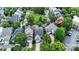 A birds-eye view shows a well-manicured lawn and established trees surrounding the home at 126 Blandina Ct, Fort Mill, SC 29708