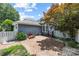 The backyard features a brick patio, white fence, blue siding, and a garden area at 126 Blandina Ct, Fort Mill, SC 29708