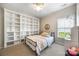 Charming bedroom featuring built-in shelving, cozy decor, and a bright window at 126 Blandina Ct, Fort Mill, SC 29708