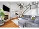 Spacious living room with fireplace, hardwood floors, and staircase at 126 Blandina Ct, Fort Mill, SC 29708