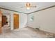 Bedroom with wallpaper border, window for natural light and neutral carpet at 128 Howie St, Mount Holly, NC 28120