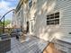 Exterior view of a deck with patio furniture and a sliding door at 130 Nims Spring Dr, Fort Mill, SC 29715