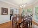 Traditional dining room with hardwood floors, crown molding, and a chandelier at 130 Nims Spring Dr, Fort Mill, SC 29715