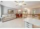Open upstairs living room has a sofa and chairs at 130 Nims Spring Dr, Fort Mill, SC 29715