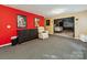 Entertaining space featuring colorful walls, comfortable seating, and a doorway leading to a media room at 130 Nims Spring Dr, Fort Mill, SC 29715