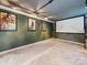 Home theater featuring a dark color palette, a large screen, projector, and recessed lighting at 130 Nims Spring Dr, Fort Mill, SC 29715
