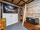 Unique storage area featuring wood-paneled walls, a custom shelf, and a solid white door at 130 Nims Spring Dr, Fort Mill, SC 29715
